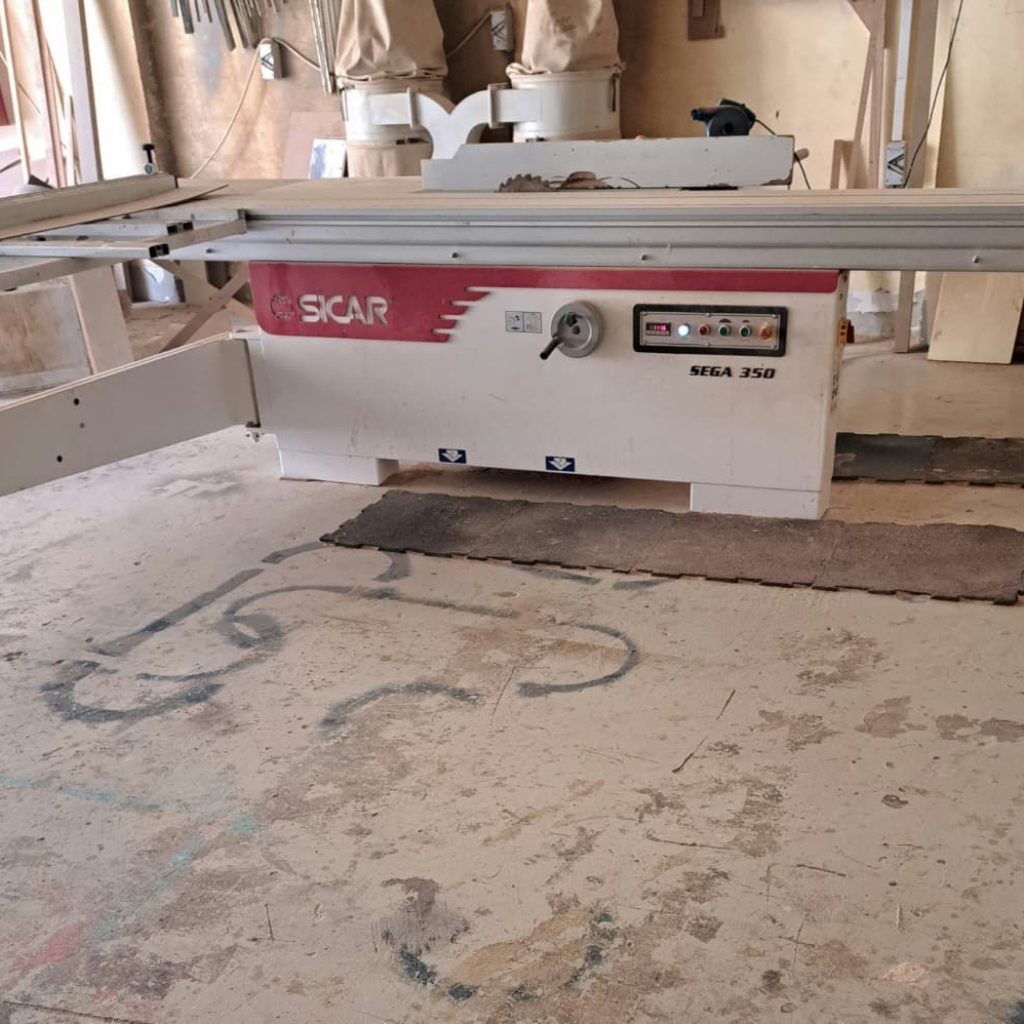 Used industrial sliding table panel saw machine for heavy-duty woodworking and MDF board cutting.