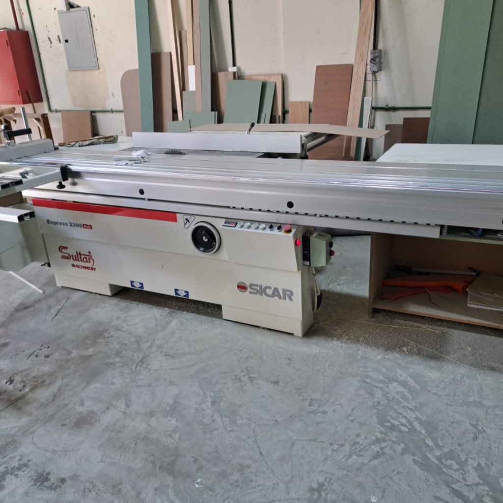 Used industrial sliding table panel saw machine for heavy-duty woodworking and MDF board cutting.