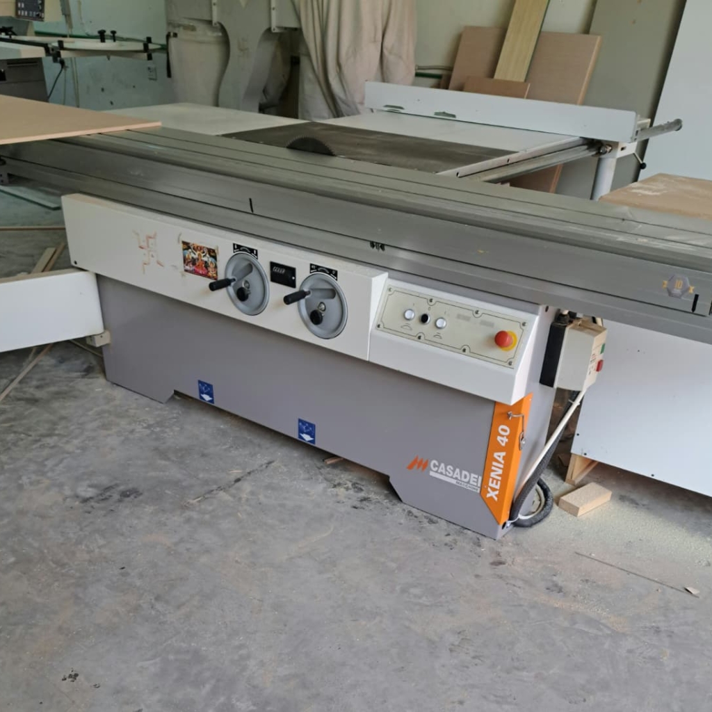 Used industrial sliding table panel saw machine for heavy-duty woodworking and MDF board cutting.