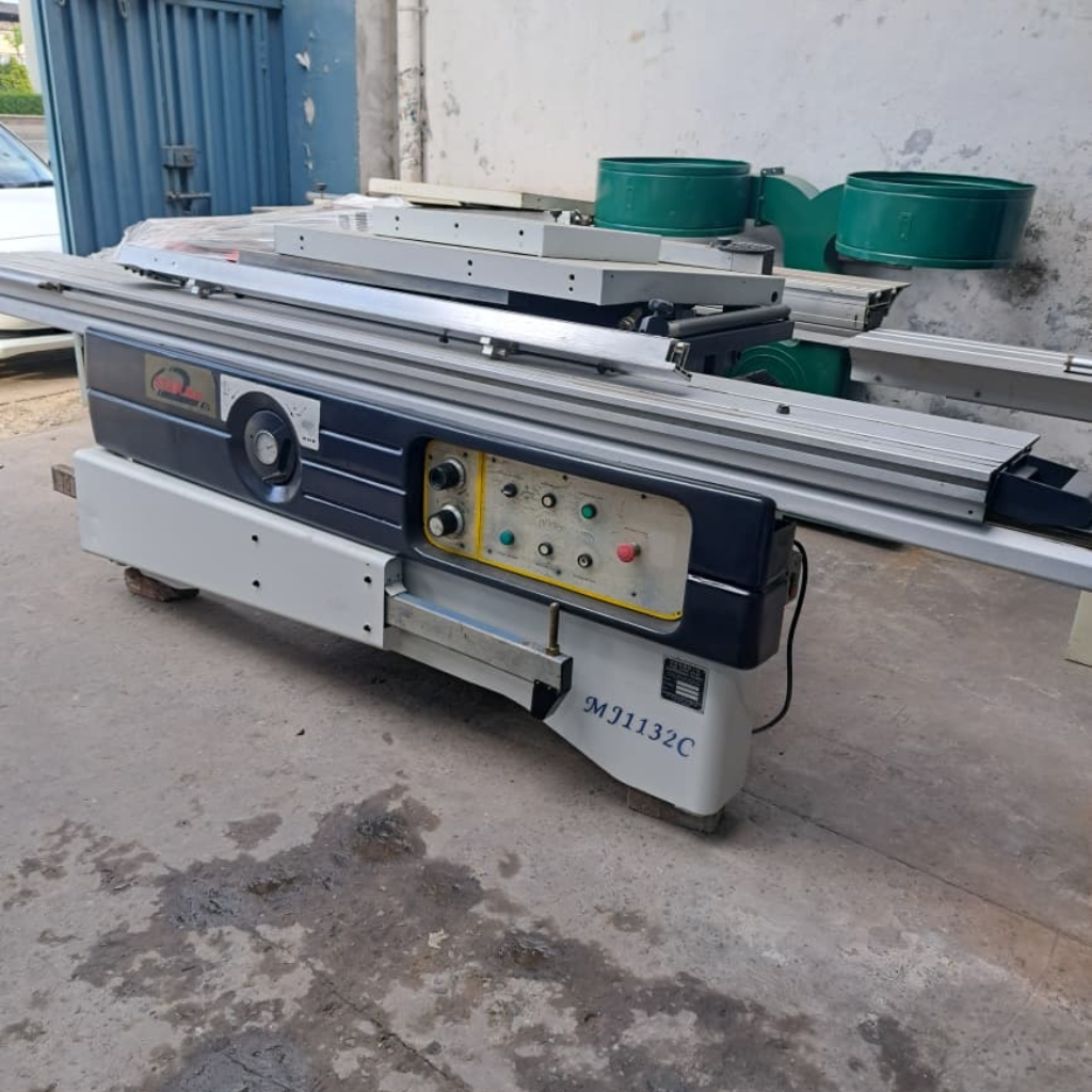 Used industrial sliding table panel saw machine for heavy-duty woodworking and MDF board cutting.